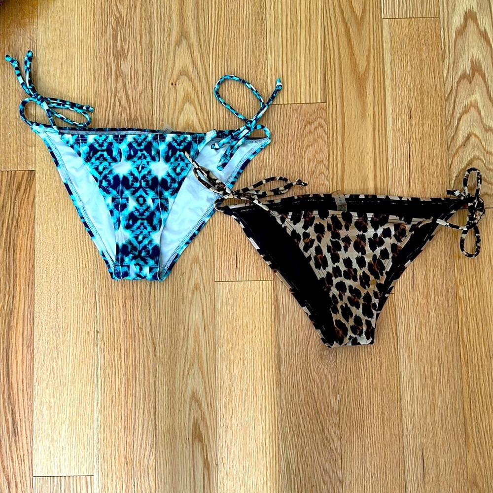 Two Victoria’s Secret bathing suit bottoms